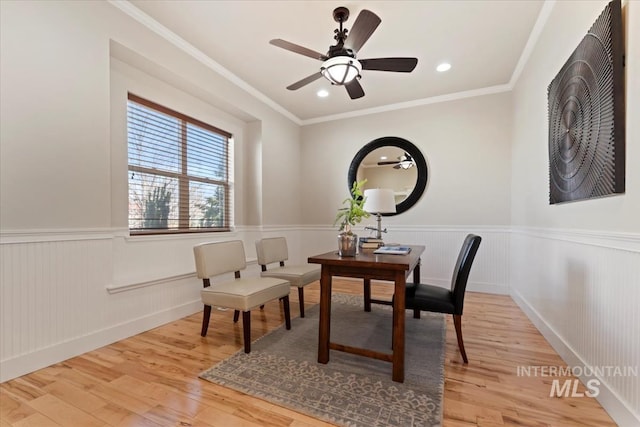 25374 W Deep Canyon Dr, Star, ID 83644 - home office featuring a wainscoted wall, wood finished floors, ornamental molding, ceiling fan, and recessed lighting