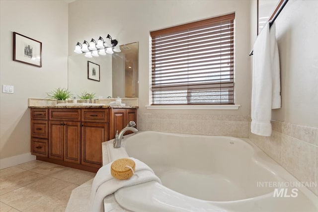 25374 W Deep Canyon Dr, Star, ID 83644 - bathroom featuring vanity, a bath, and tile patterned floors
