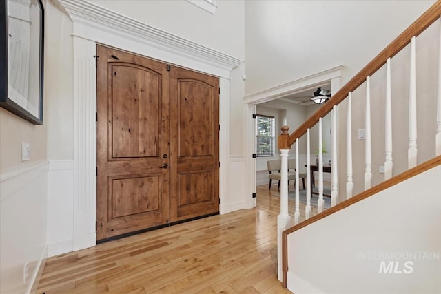 25374 W Deep Canyon Dr, Star, ID 83644 - entryway with stairway, light wood-style floors, and a ceiling fan