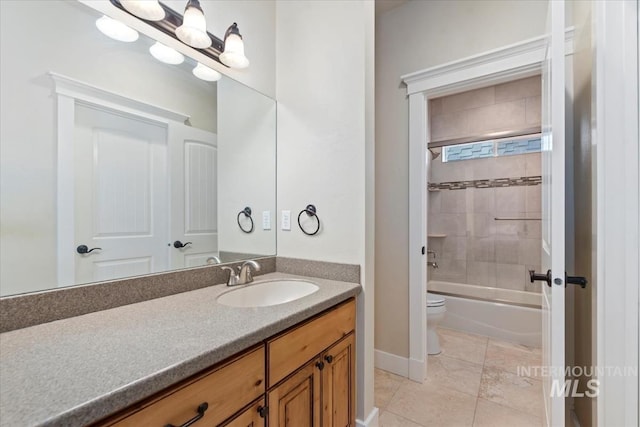 25374 W Deep Canyon Dr, Star, ID 83644 - full bathroom featuring toilet, vanity, shower / bathtub combination, tile patterned flooring, and baseboards