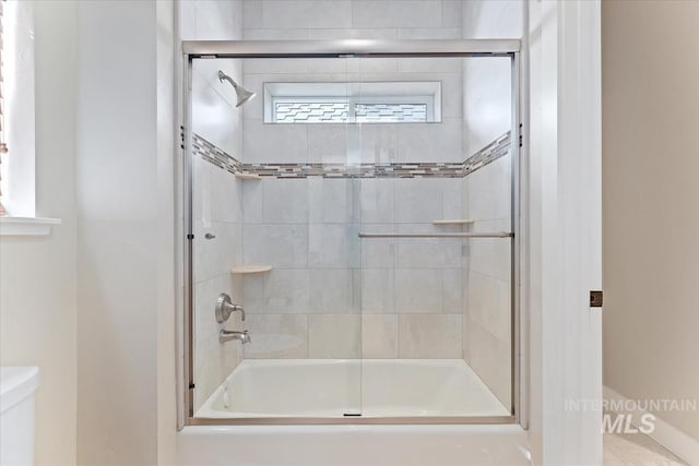 25374 W Deep Canyon Dr, Star, ID 83644 - bathroom with toilet and combined bath / shower with glass door