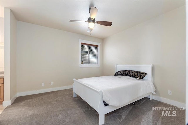 25374 W Deep Canyon Dr, Star, ID 83644 - carpeted bedroom with baseboards and a ceiling fan