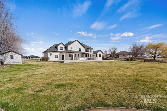 25374 W Deep Canyon Dr, Star, ID 83644 - rear view of property with an outbuilding and a patio