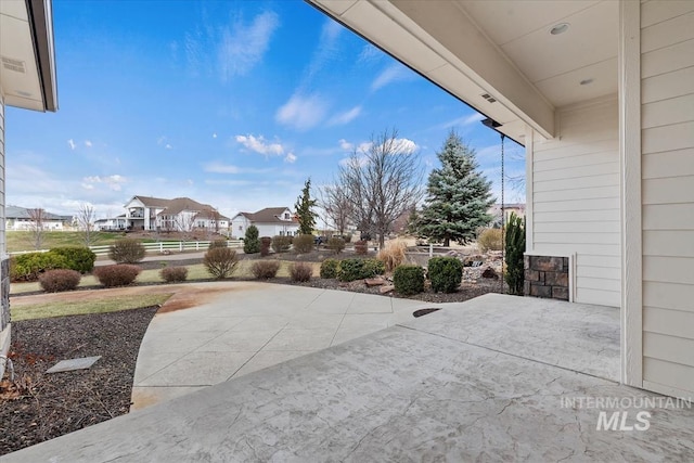 25374 W Deep Canyon Dr, Star, ID 83644 - view of patio featuring a residential view