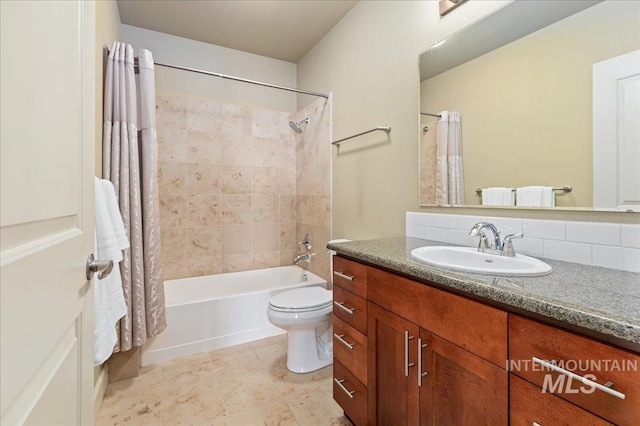 full bathroom with tasteful backsplash, vanity, shower / bath combo, and toilet