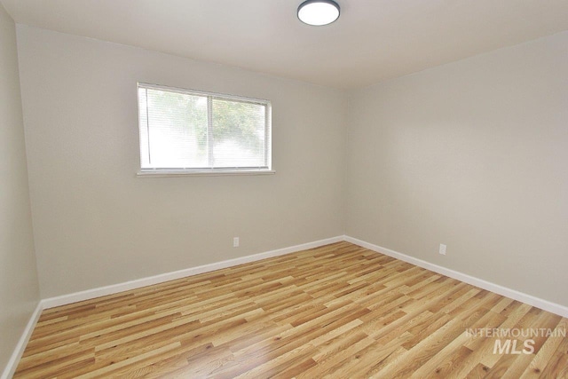 empty room with light wood-type flooring