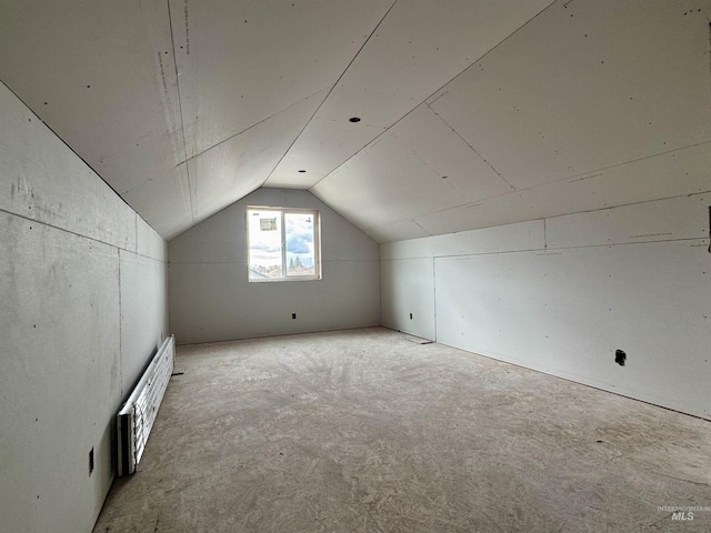 bonus room with vaulted ceiling
