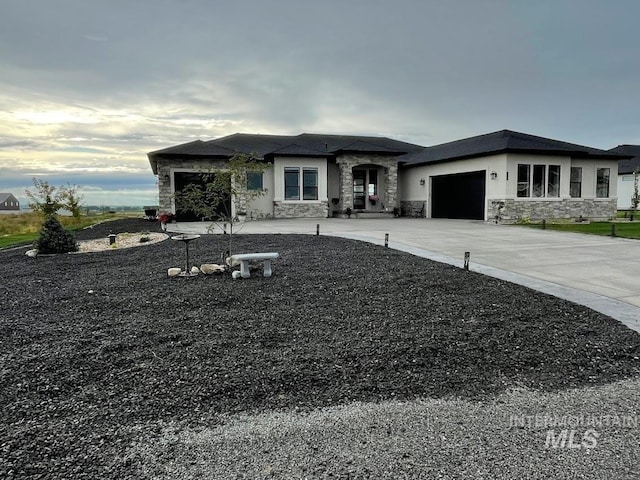 prairie-style home with a garage