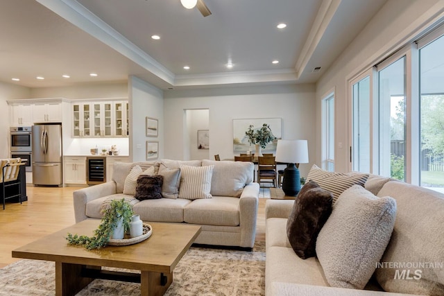 4014 W Farm View Dr, Boise, ID 83714 - living room featuring beverage cooler, plenty of natural light, a tray ceiling, a bar, and recessed lighting