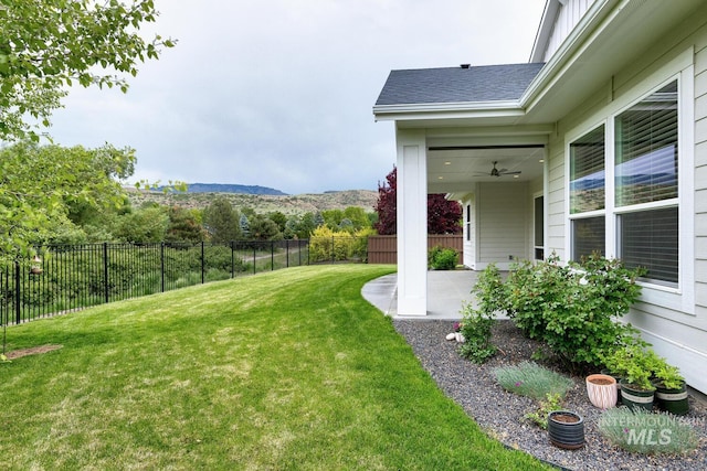 4014 W Farm View Dr, Boise, ID 83714 - view of yard featuring a patio, ceiling fan, and a mountain view