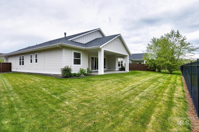 4014 W Farm View Dr, Boise, ID 83714 - rear view of property featuring board and batten siding, a patio, and a ceiling fan