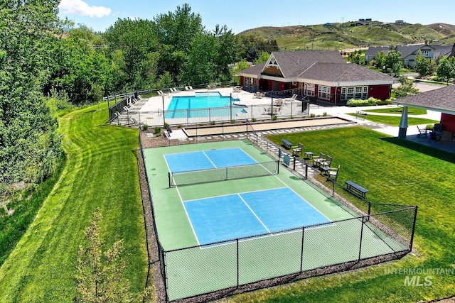 4014 W Farm View Dr, Boise, ID 83714 - view of tennis court with a community pool and a mountain view