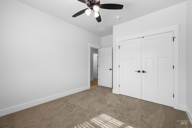 875 N 14th St, Payette, ID 83661 - unfurnished bedroom featuring carpet, baseboards, a closet, and a ceiling fan