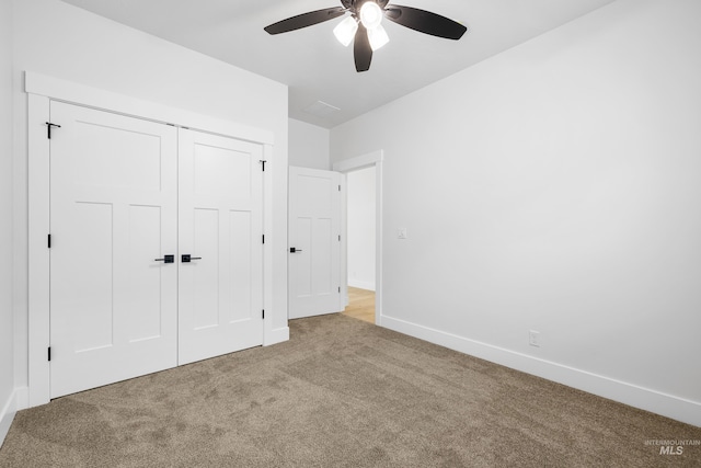 875 N 14th St, Payette, ID 83661 - unfurnished bedroom featuring carpet flooring, baseboards, a closet, and ceiling fan