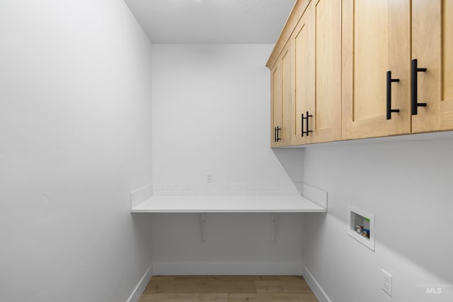 875 N 14th St, Payette, ID 83661 - laundry room with cabinet space, washer hookup, baseboards, light wood-style flooring, and an office area