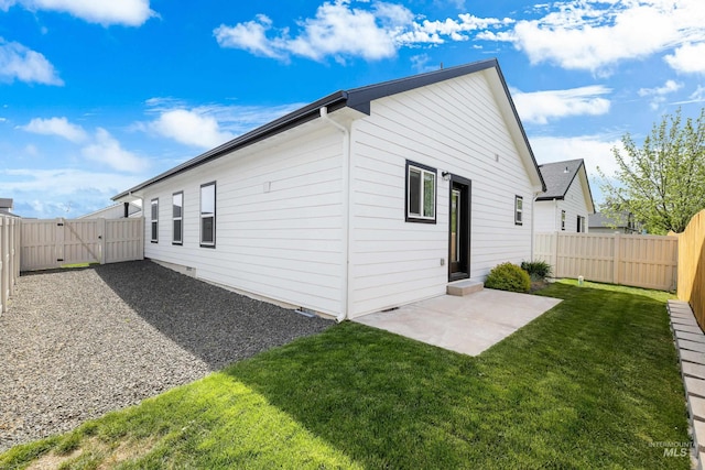 875 N 14th St, Payette, ID 83661 - back of house with a gate and a patio