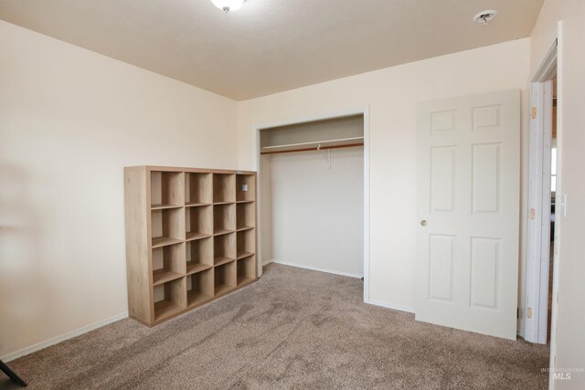 2059 Spring Creek Dr, Fruitland, ID 83619 - unfurnished bedroom with carpet, a closet, and baseboards