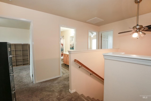 2059 Spring Creek Dr, Fruitland, ID 83619 - hallway featuring carpet floors, baseboards, and an upstairs landing