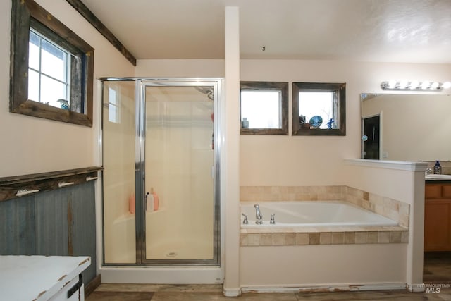 2059 Spring Creek Dr, Fruitland, ID 83619 - bathroom with vanity, a garden tub, and a stall shower
