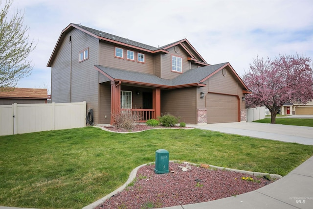 2059 Spring Creek Dr, Fruitland, ID 83619 - craftsman-style home with a porch, driveway, a front yard, and fence