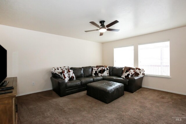 2059 Spring Creek Dr, Fruitland, ID 83619 - living area with carpet flooring, baseboards, and a ceiling fan