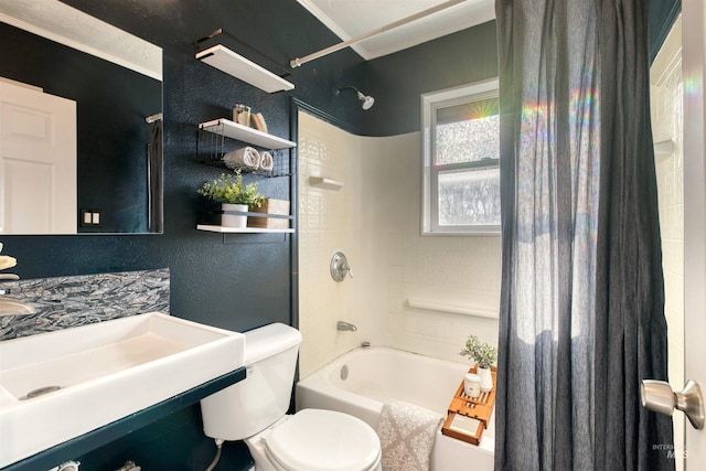 full bathroom with sink, toilet, shower / bath combo with shower curtain, and ornamental molding