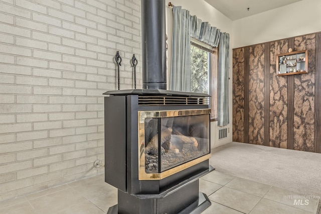 1245 SW 3rd Ave, Ontario, OR 97914 - detailed view of carpet flooring and a wood stove