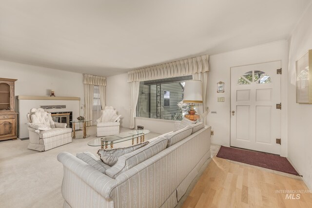 1245 SW 3rd Ave, Ontario, OR 97914 - living area with a glass covered fireplace and wood finished floors