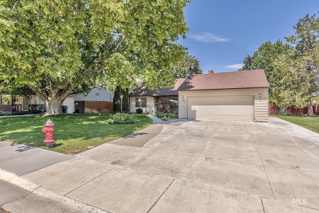 1245 SW 3rd Ave, Ontario, OR 97914 - view of front of home with driveway and a garage