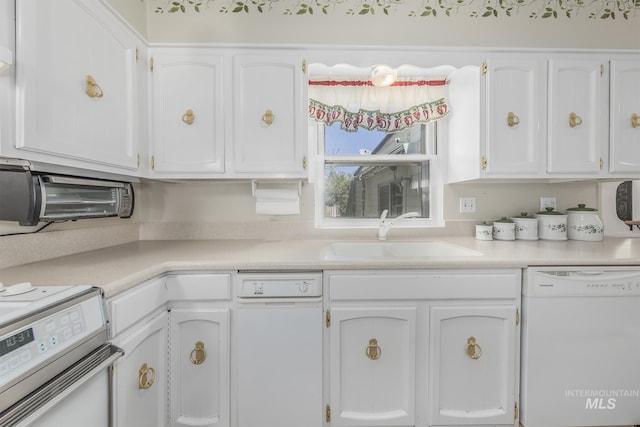 1245 SW 3rd Ave, Ontario, OR 97914 - kitchen featuring dishwasher, range, white cabinets, and a sink