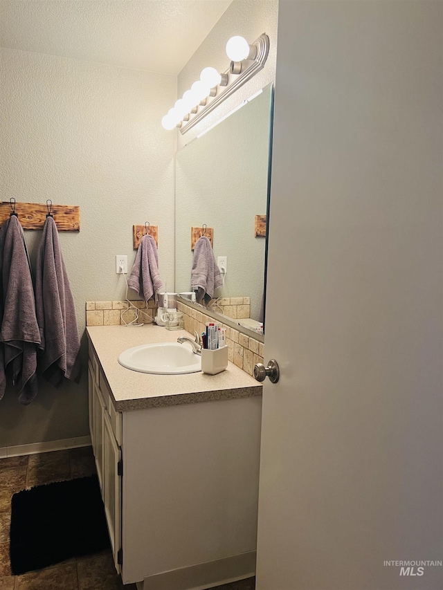 bathroom featuring vanity and tile patterned flooring