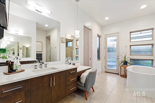 1891 E Golden Oak Ct, Meridian, ID 83646 - full bathroom with a shower stall, a freestanding bath, tile patterned floors, vanity, and recessed lighting