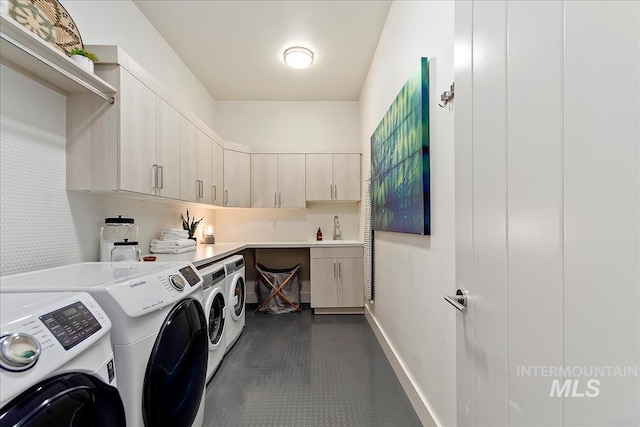 1891 E Golden Oak Ct, Meridian, ID 83646 - washroom with washer and dryer, cabinet space, and baseboards