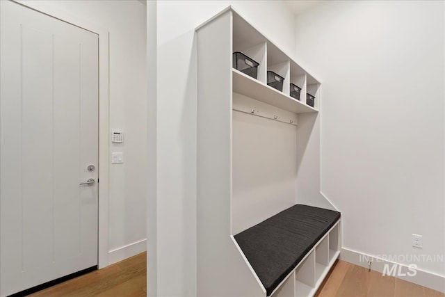 1891 E Golden Oak Ct, Meridian, ID 83646 - mudroom featuring wood finished floors and baseboards