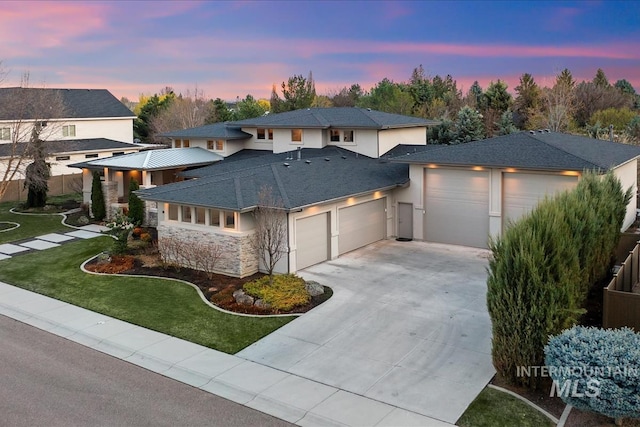 1891 E Golden Oak Ct, Meridian, ID 83646 - view of front of property with an attached garage, driveway, stucco siding, a front lawn, and a shingled roof