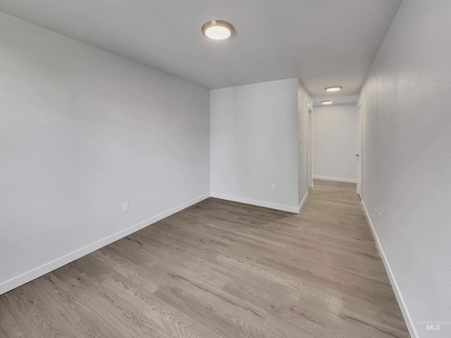 5394 N Elmstone Ave, Meridian, ID 83646 - unfurnished room with light wood-style floors and baseboards