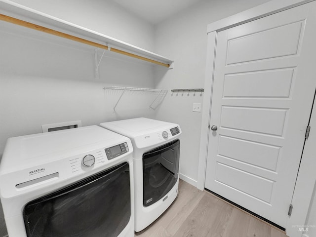 5394 N Elmstone Ave, Meridian, ID 83646 - laundry room with independent washer and dryer and light wood-type flooring