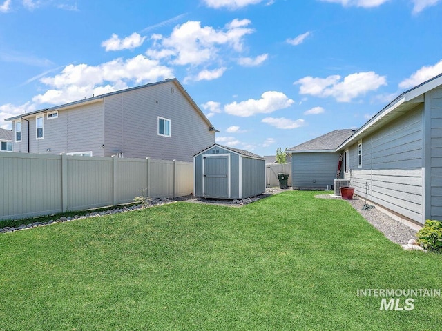 5394 N Elmstone Ave, Meridian, ID 83646 - view of yard featuring a shed, an outbuilding, and central AC unit