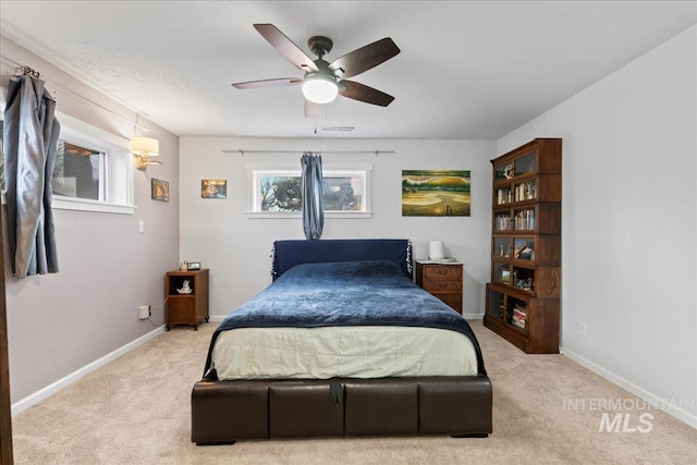 bedroom featuring carpet, visible vents, and baseboards