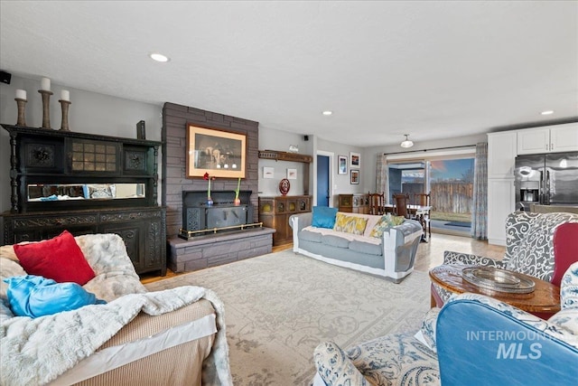 living area featuring recessed lighting