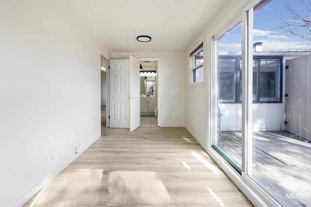 empty room with light wood-style floors