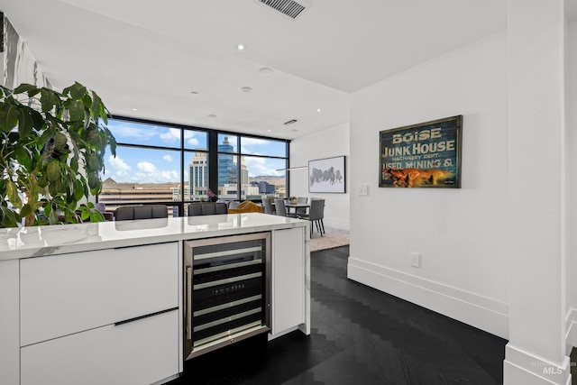 255 S Capitol Blvd Unit 1403, Boise, ID 83702 - bar featuring wine cooler and expansive windows