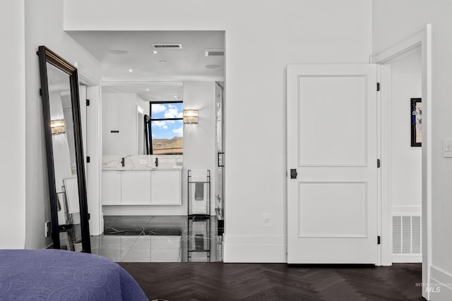 255 S Capitol Blvd Unit 1403, Boise, ID 83702 - bedroom featuring baseboards and ensuite bathroom