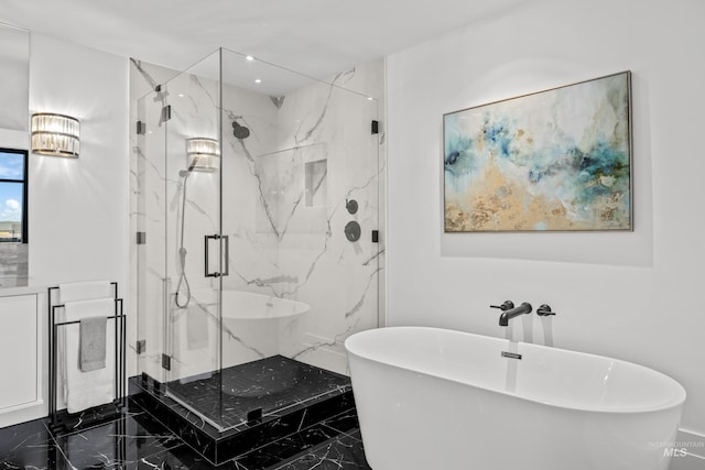 255 S Capitol Blvd Unit 1403, Boise, ID 83702 - full bathroom featuring marble tiled floors, a freestanding bath, and a marble finish shower