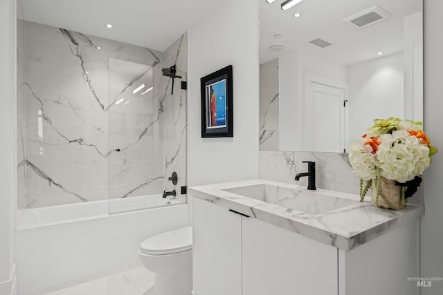 255 S Capitol Blvd Unit 1403, Boise, ID 83702 - full bath featuring vanity, recessed lighting, bathing tub / shower combination, and marble look tiles