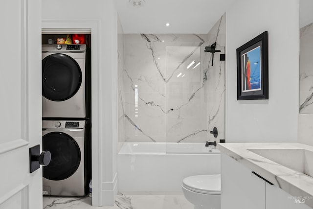 255 S Capitol Blvd Unit 1403, Boise, ID 83702 - full bath with stacked washer / dryer, marble look tiles, bathtub / shower combination, and vanity