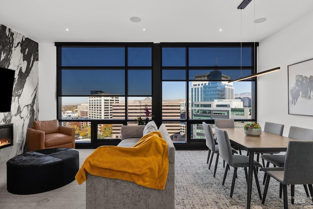 255 S Capitol Blvd Unit 1403, Boise, ID 83702 - dining room with expansive windows, a view of city, and a fireplace