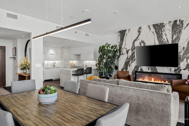 255 S Capitol Blvd Unit 1403, Boise, ID 83702 - dining area featuring a premium fireplace and recessed lighting