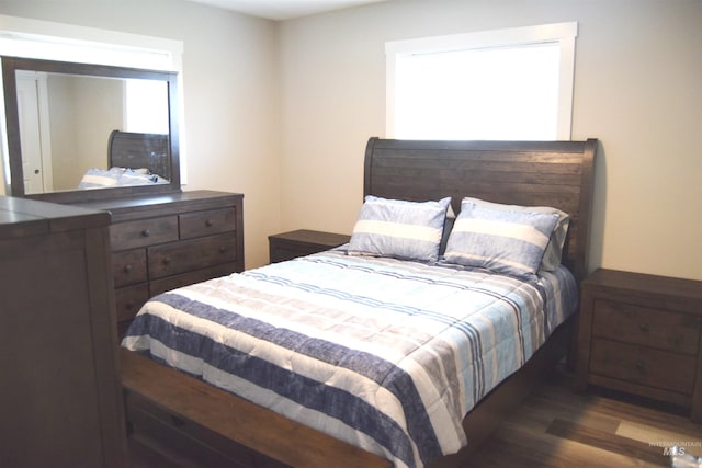 bedroom featuring wood finished floors