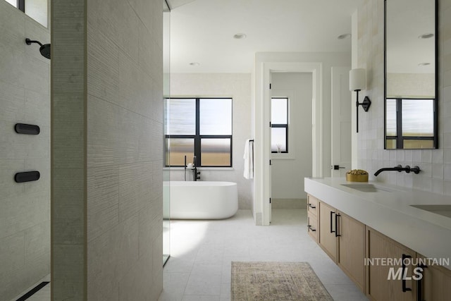11444 N 17th Way, Boise, ID 83714 - bathroom featuring a walk in shower, a soaking tub, vanity, tile patterned floors, and tasteful backsplash